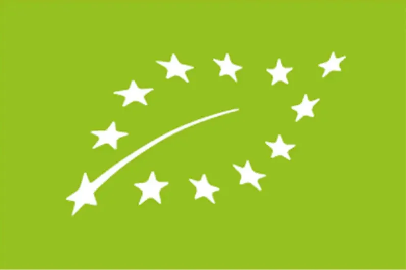 EU-Bio-Logo: aus weißen Sternen geformtes Blatt auf grünem Hintergrund