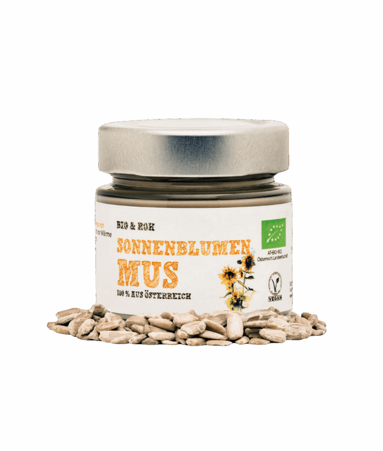 Schalk Mühle organic sunflower purée, front of jar, with shelled sunflower kernels in front