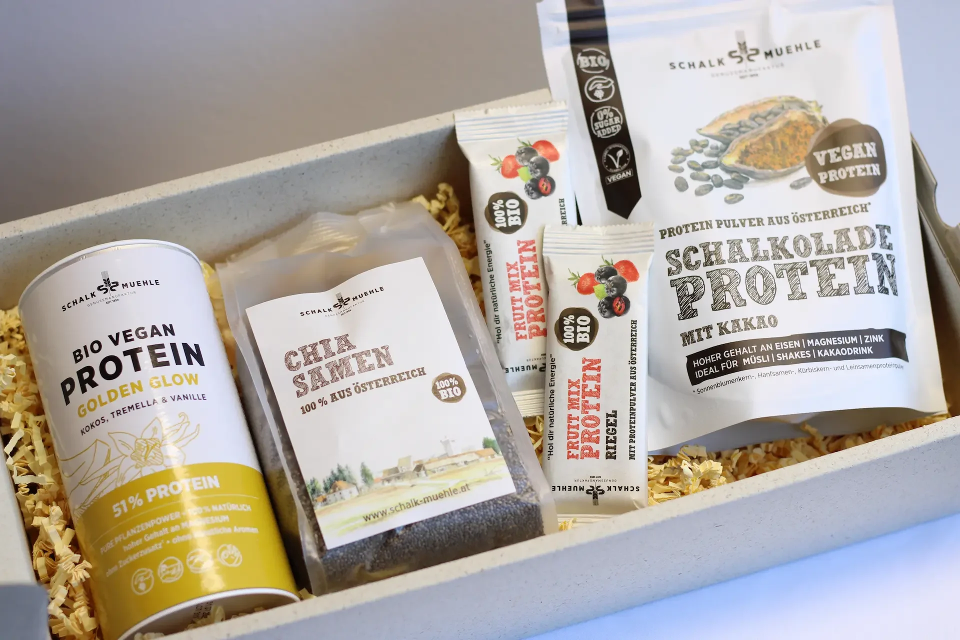 Gift box with Vegan Protein, chia seeds, fruit bars, and Schalkolade Protein