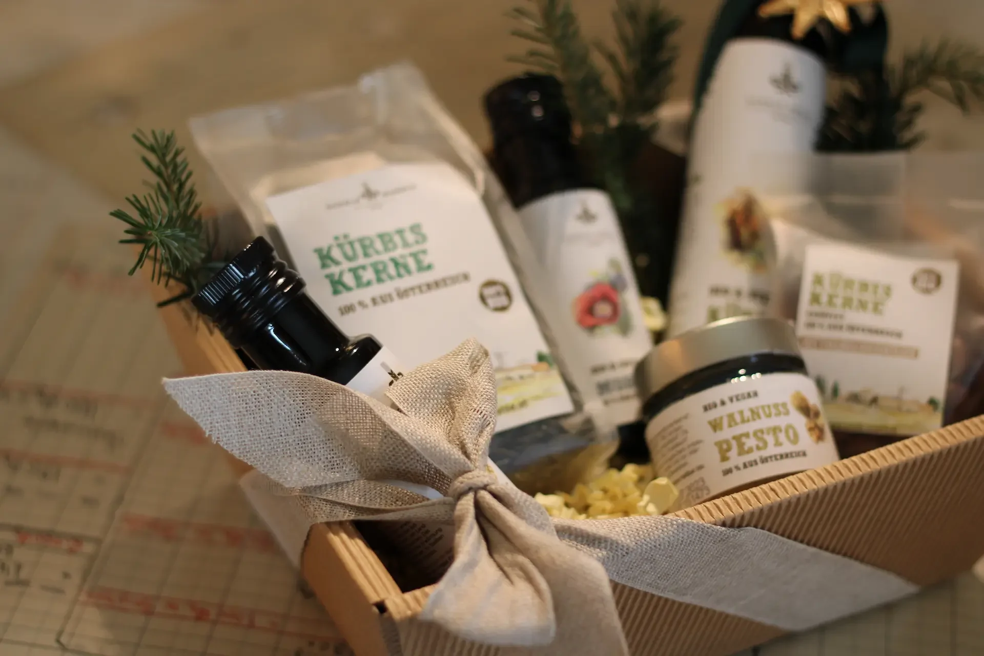 Gift box with pumpkin seed oil, spread in a jar, and green pumpkin kernel snack